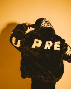 A teddy bear wearing a hat and scarf