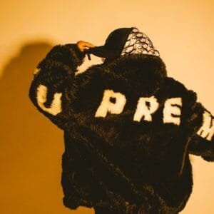 A teddy bear wearing a hat and scarf