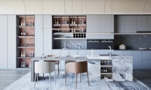 A modern kitchen with marble counter tops and cabinets