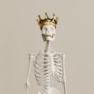 A skeleton with a crown on its head